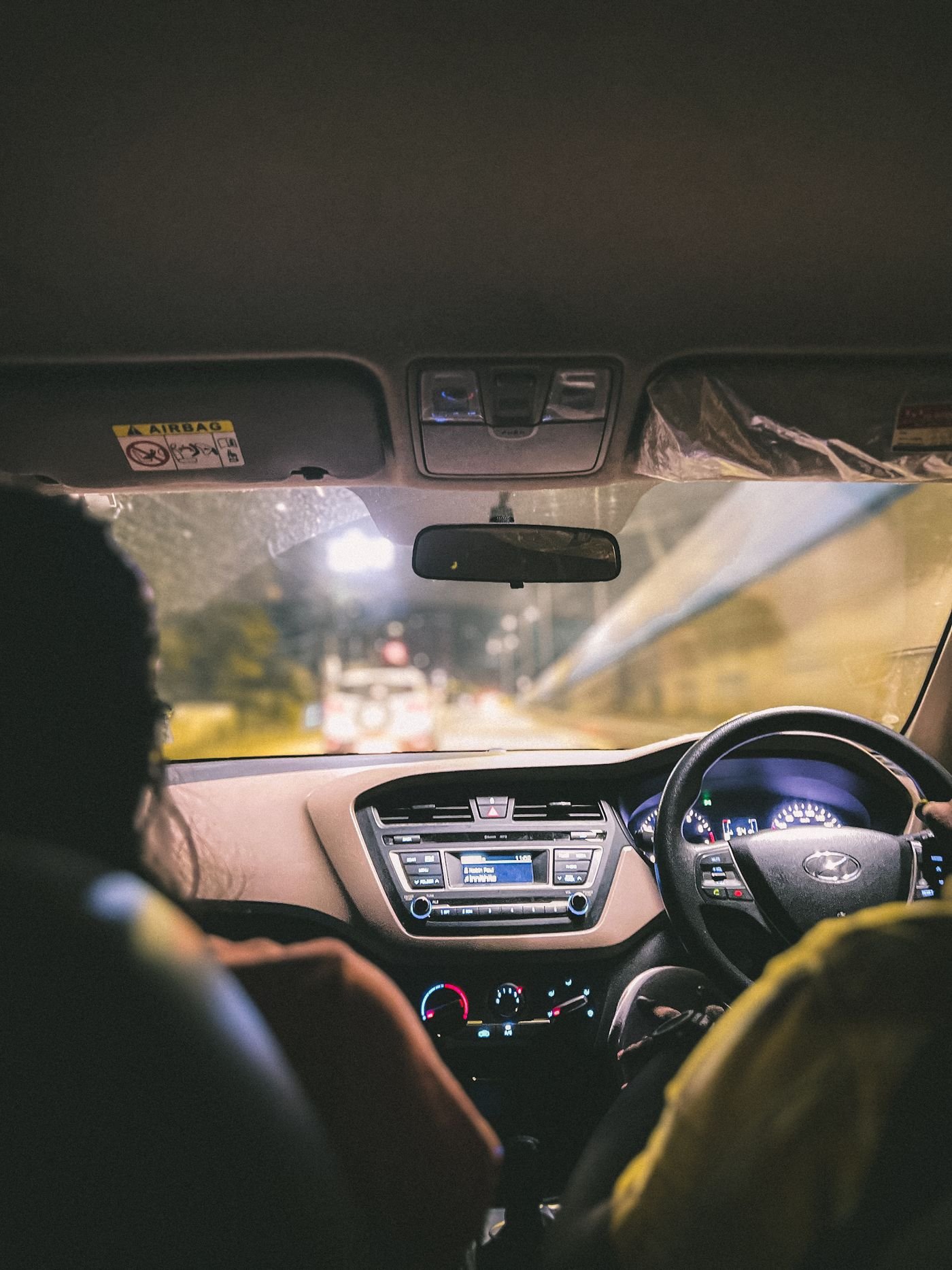 A night ride home, seen from the back seat